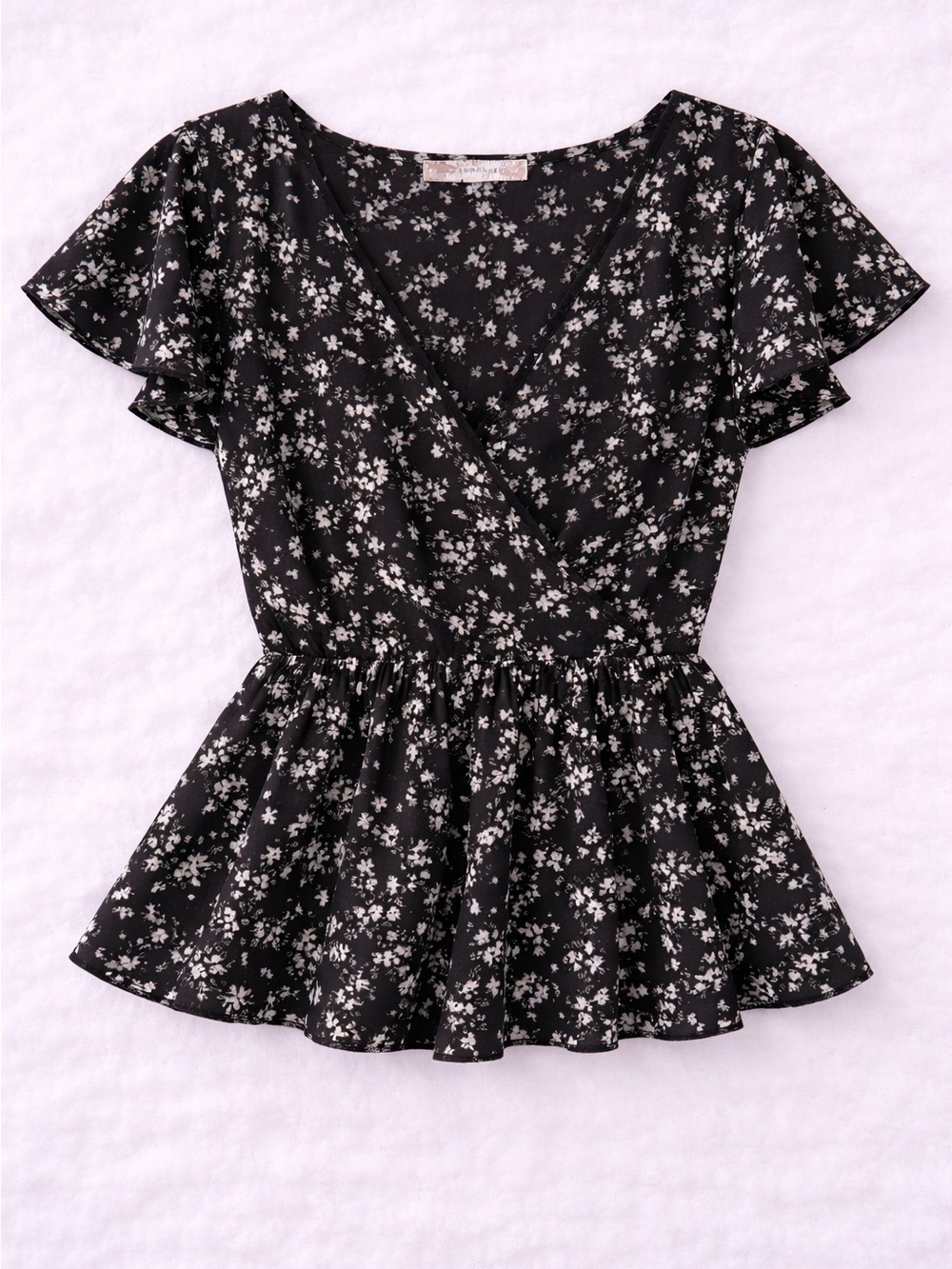 See the Shades Black Floral Ruffle Wrap Peplum Top Size L